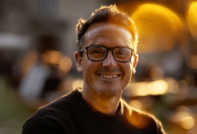 guy smiling on camera